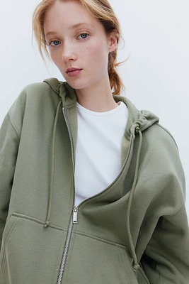 Veste à capuchon glissière