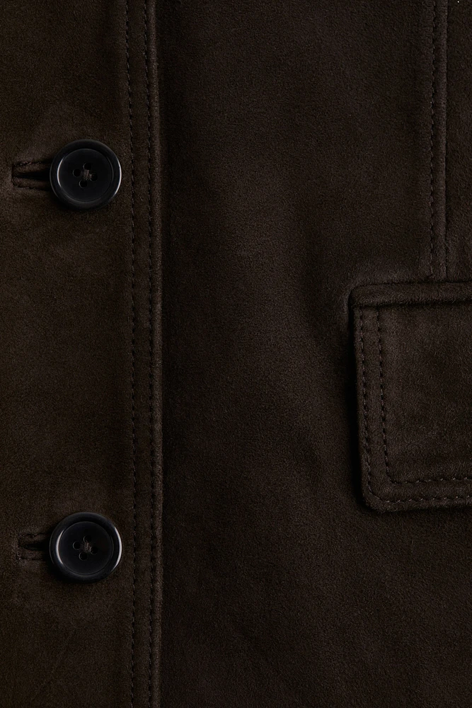 Veston à fermeture droite en cuir velours