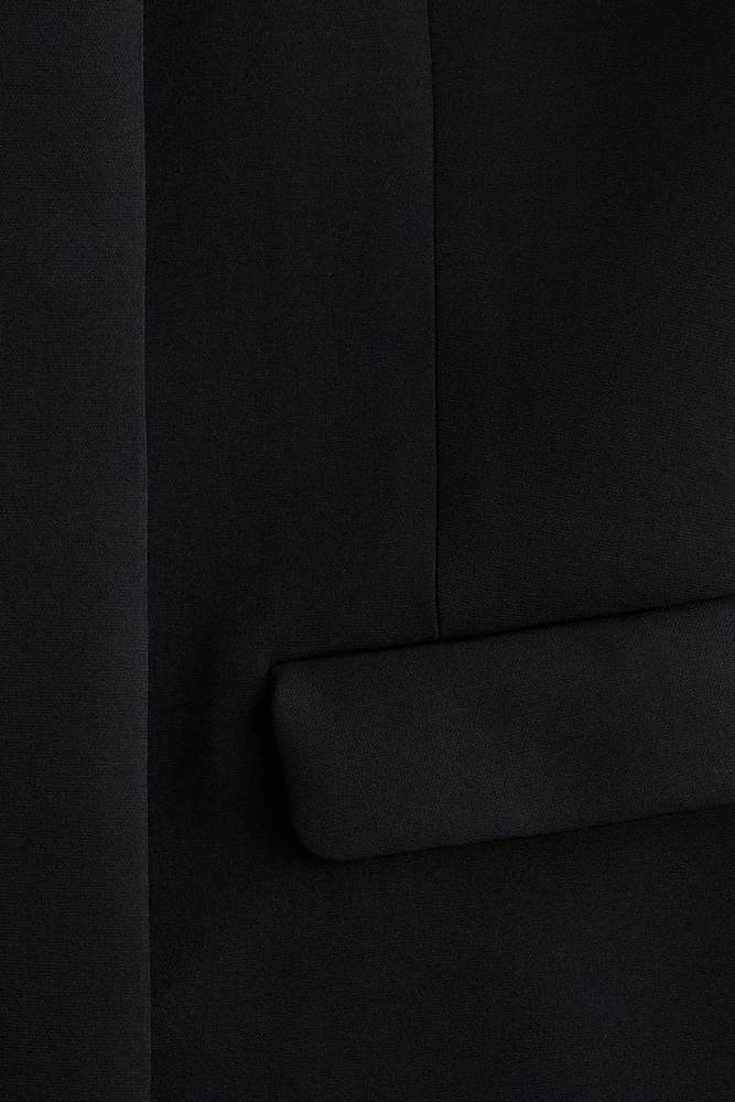 Robe sans manches avec poches décoratives