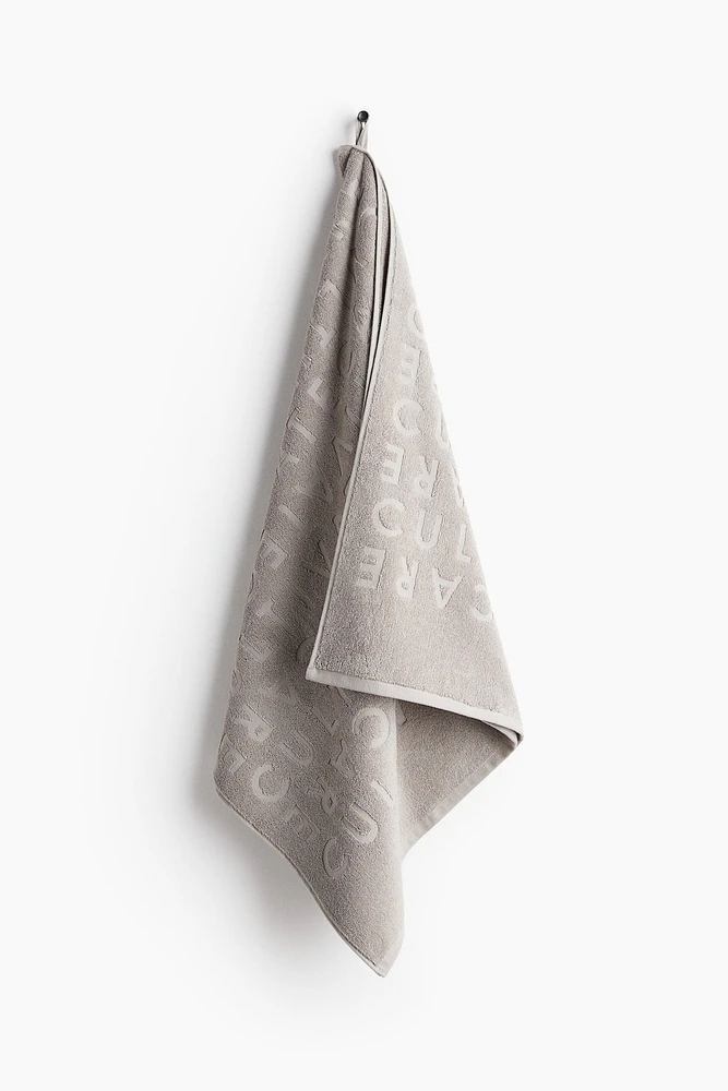 Serviette de bain en coton éponge