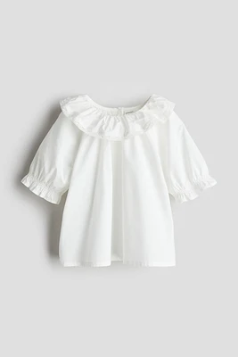 Blouse en coton avec col à volant
