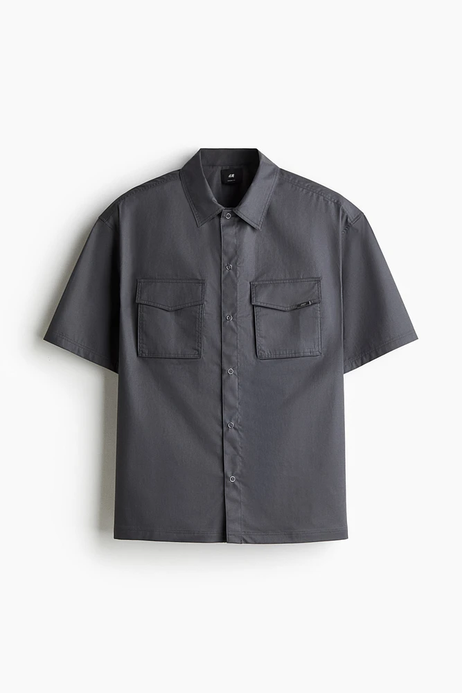 Chemise utilitaire à manches courtes coupe ample