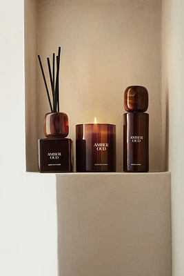 Bougie parfumée dans un pot en verre