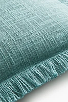 Housse de coussin en tissu flammé