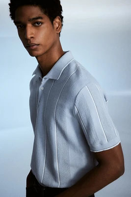 Polo coupe classique en tricot pointelle