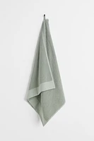 Serviette de bain en éponge de coton