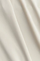 Haut asymétrique