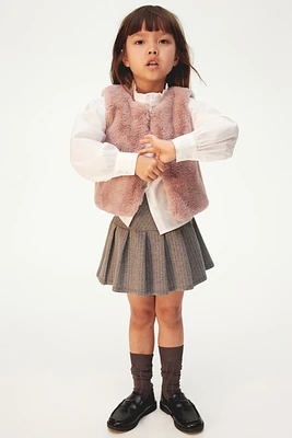 Veste sans manches duveteuse