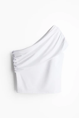 Haut asymétrique avec bord replié