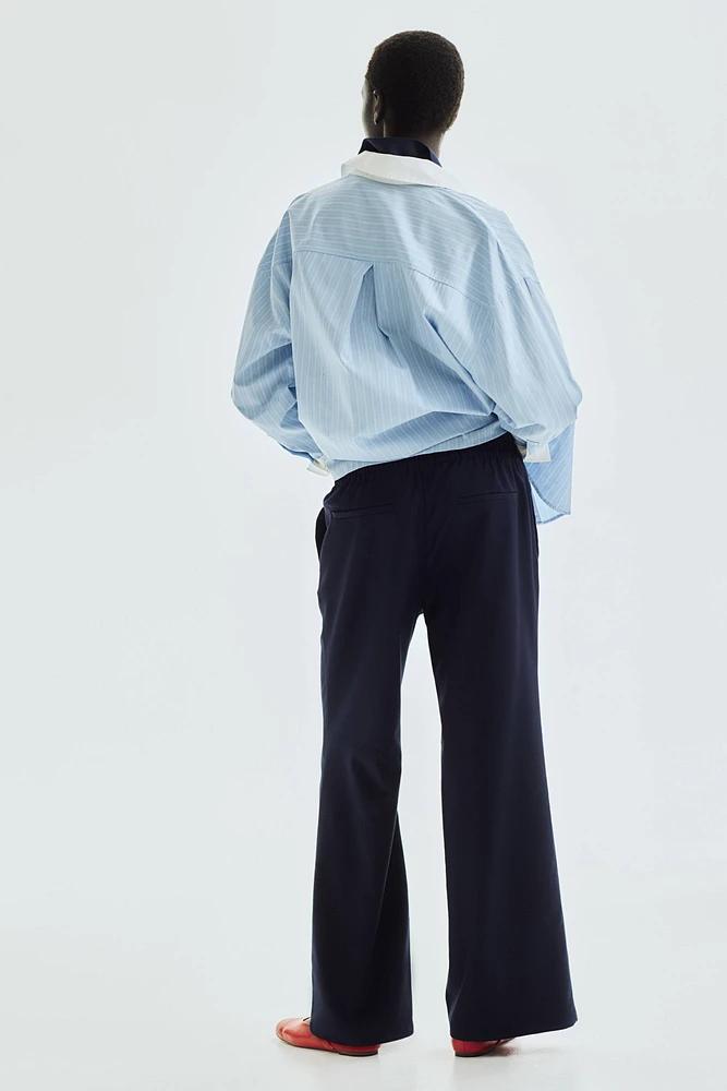 Pantalon avec cordon de serrage et plis