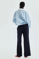 Pantalon avec cordon de serrage et plis