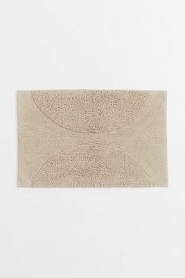 Tapis de bain touffeté