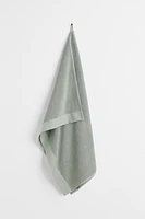 Serviette de bain en coton éponge