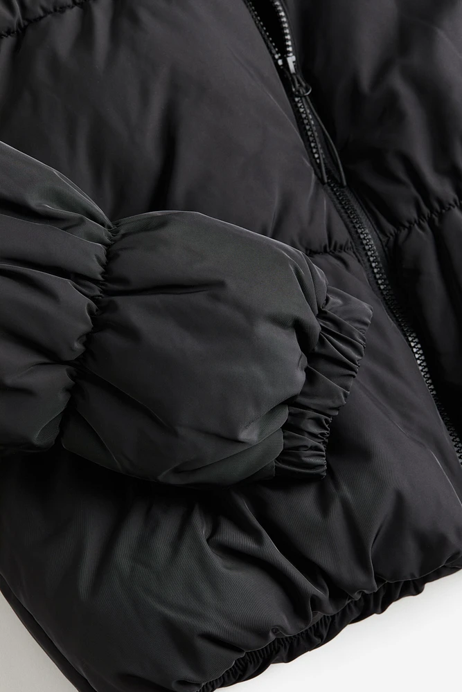 Manteau en duvet à capuchon