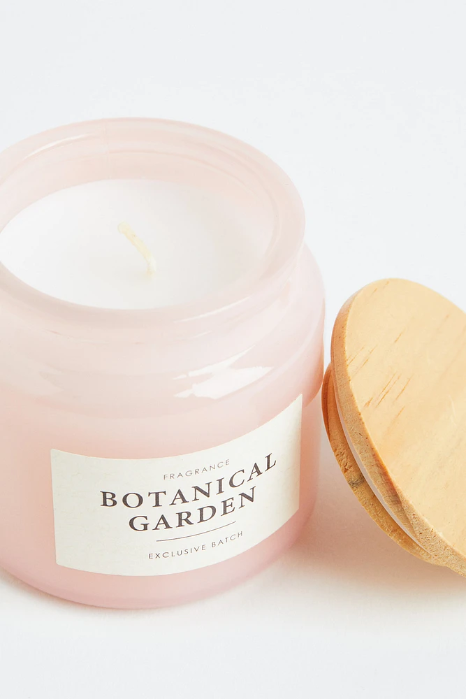 Bougie parfumée dans un pot en verre