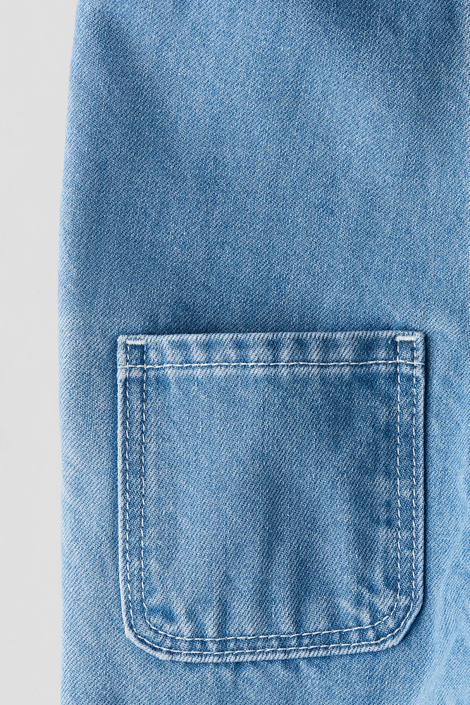Salopette en denim imprimé