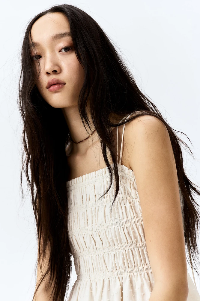 Robe en coton à corsage nid d'abeille