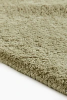 Large Asymmetric Rug