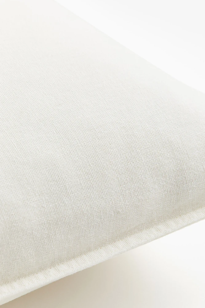 Housse de coussin en lin mélangé