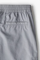 Pantalon cargo classique en sergé