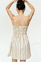 Robe en coton à corsage nid d'abeille