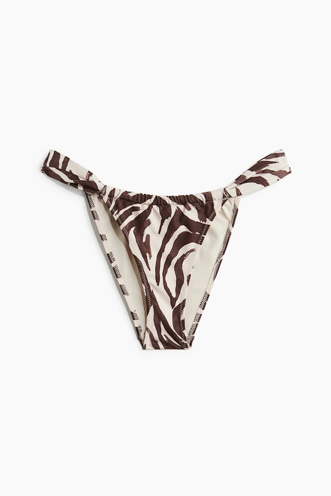 Bas de maillot Tanga échancré