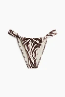 Bas de maillot Tanga échancré