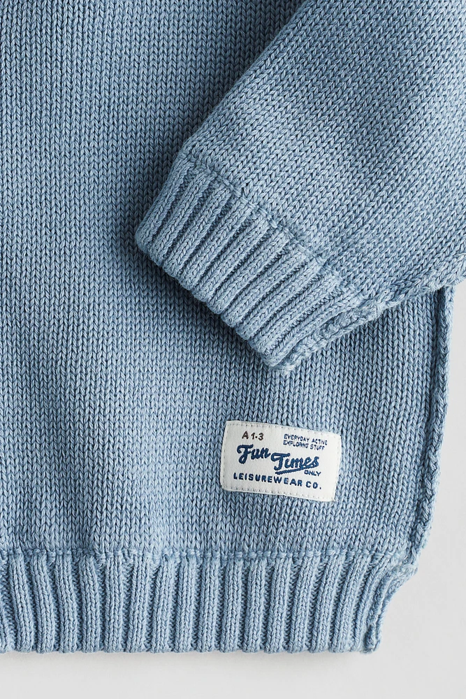 Veste tricot de coton, capuche, fermeture éclair