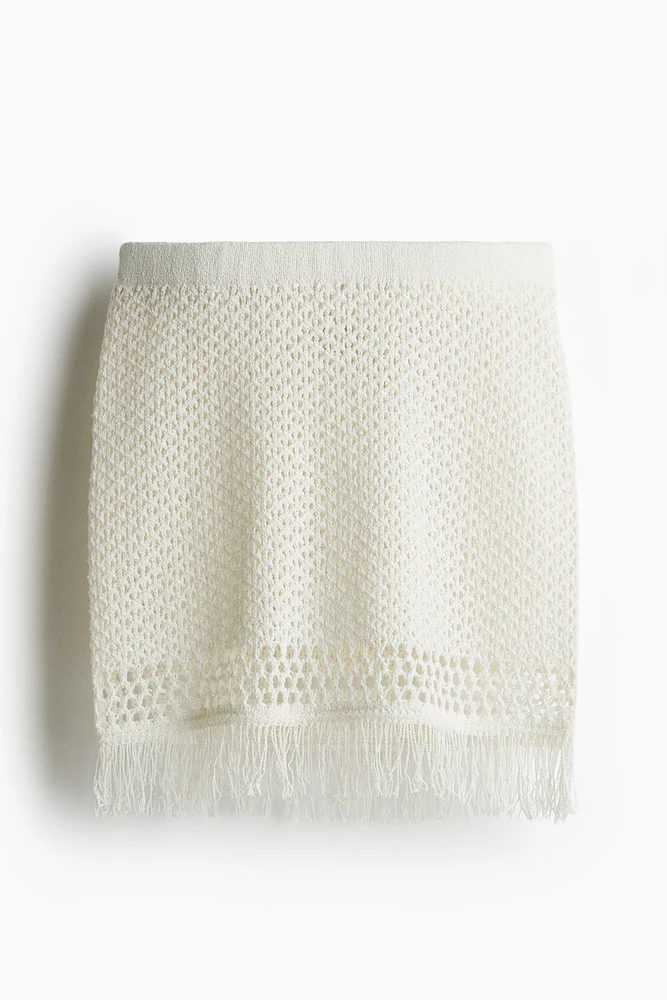 Fringe-trimmed pointelle-knit skirt