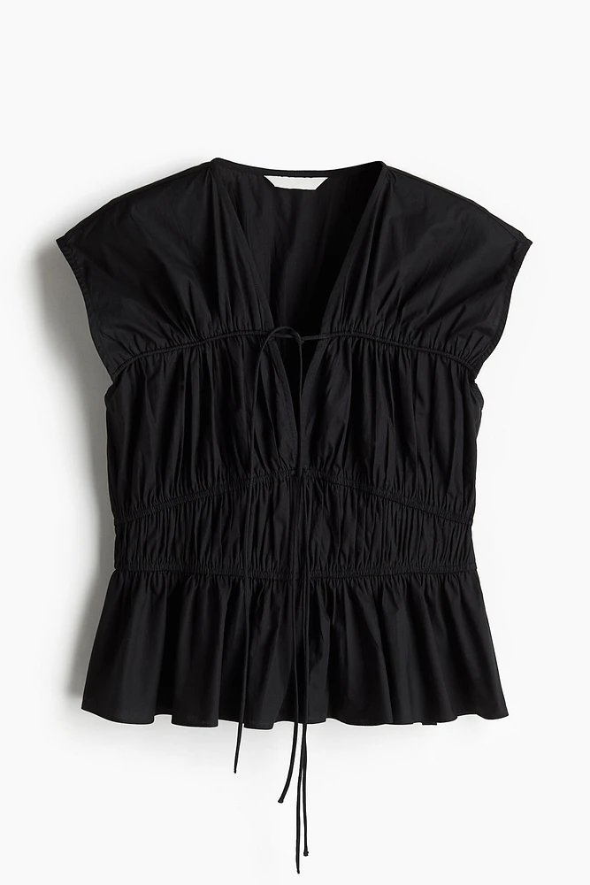Blouse en popeline avec cordons de serrage