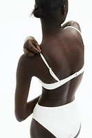 Bas de maillot échancré taille haute