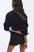 Gilet en tricot de laine côtelée