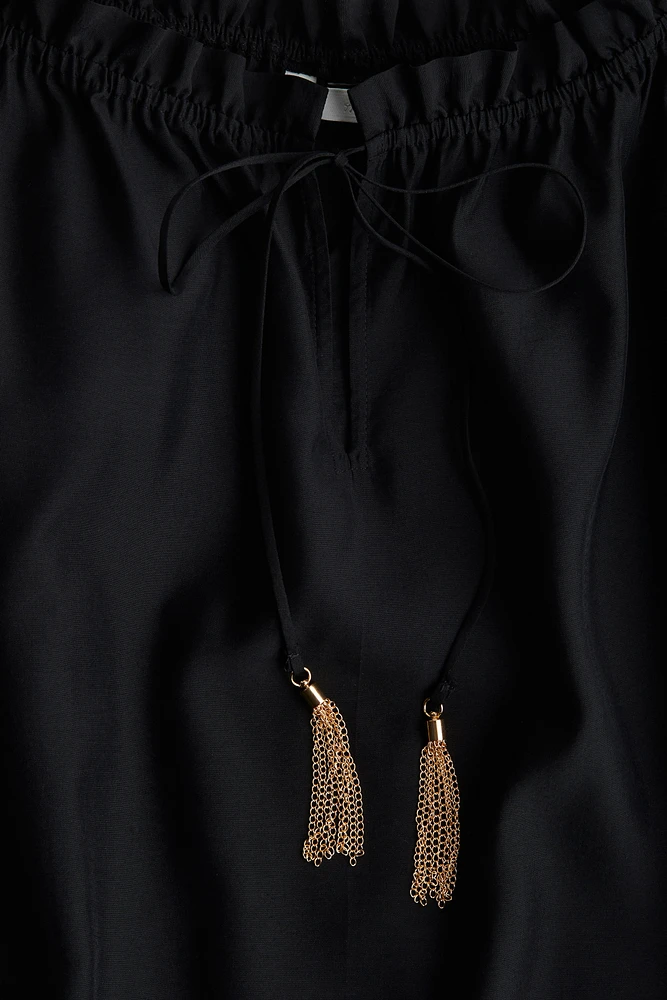 Robe avec cordon de serrage