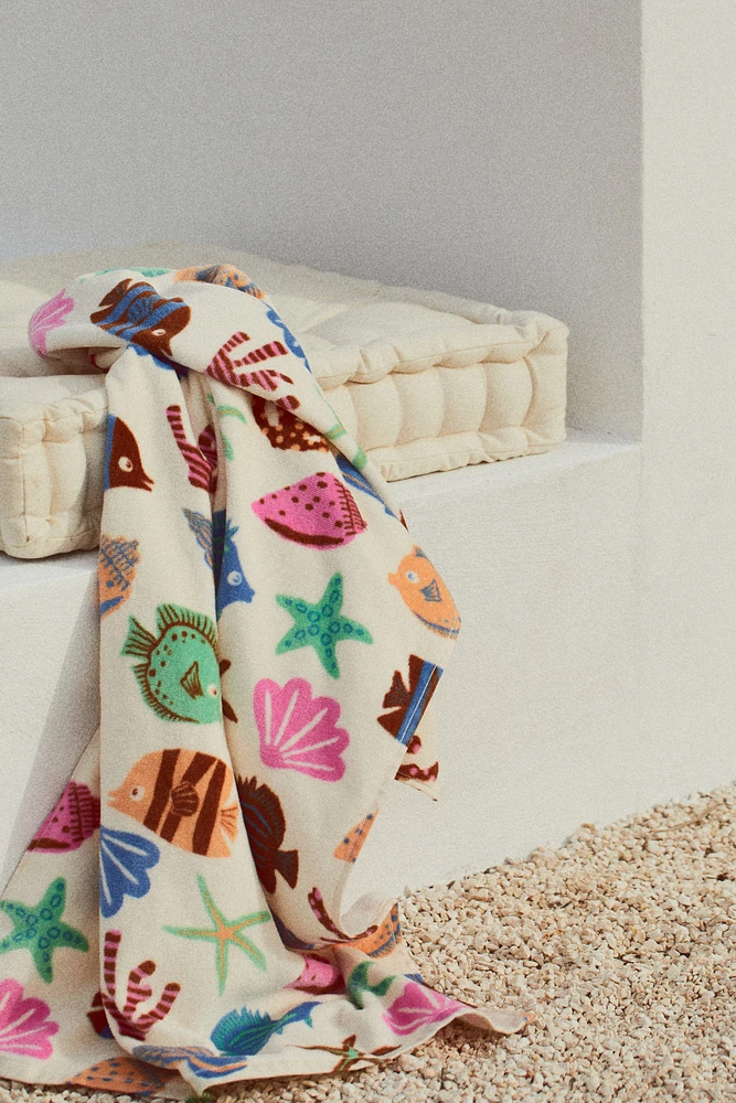 Serviette de bain à motif