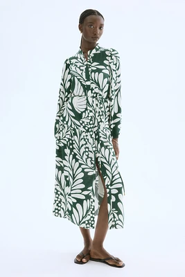 Robe longue à manches bouffantes