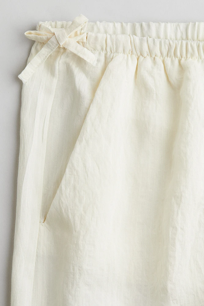 Pantalon avec détails à nouer
