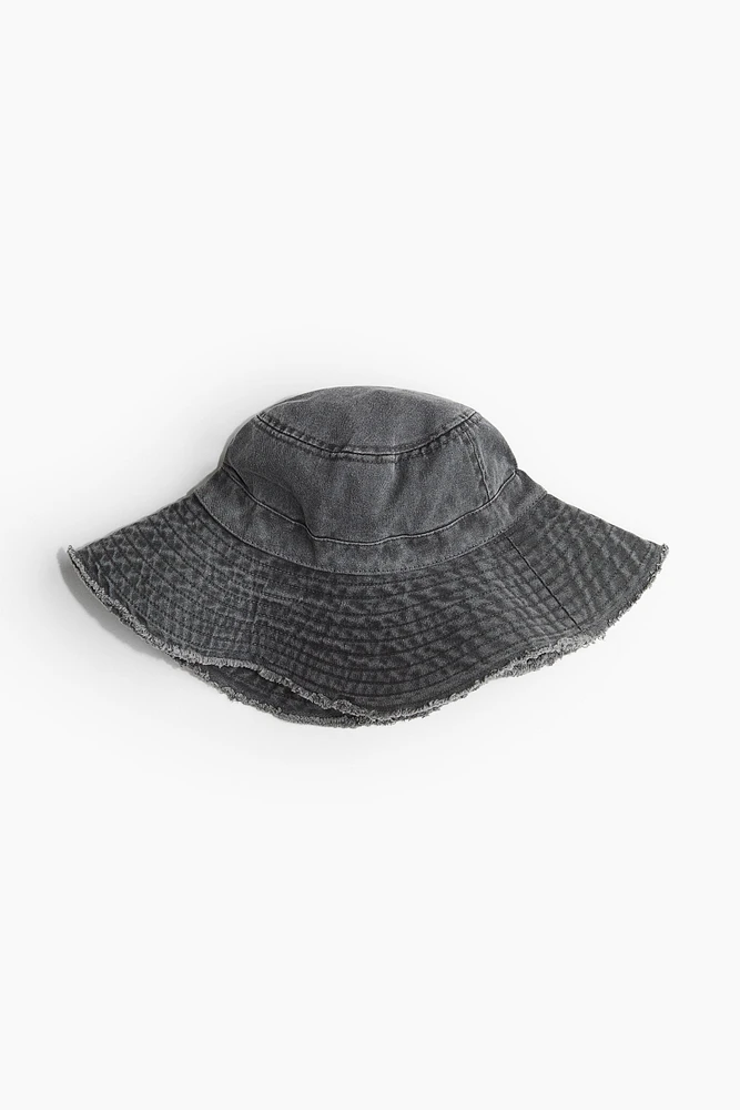 Chapeau en coton à bord frangé