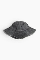 Chapeau en coton à bord frangé