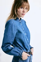 Blouse volantée en denim