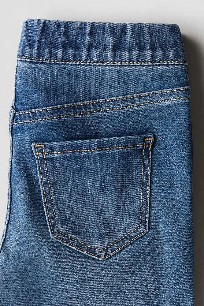 Jean Très Extensible Jambes semi-évasées