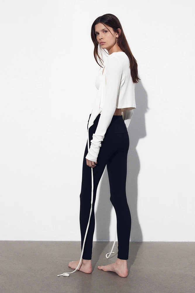 Legging avec ceinture repliable