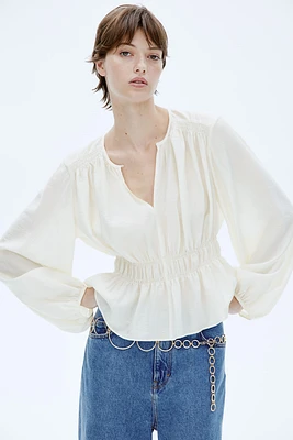 Blouse avec détails smockés