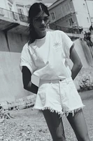Frayed-Edge Denim Shorts