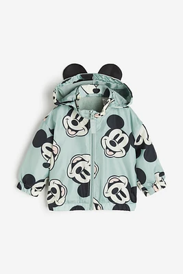 Veste à capuchon