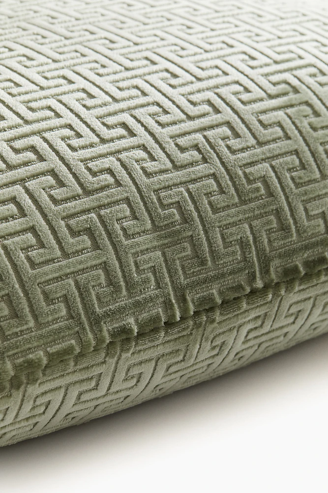 Housse de coussin à motif