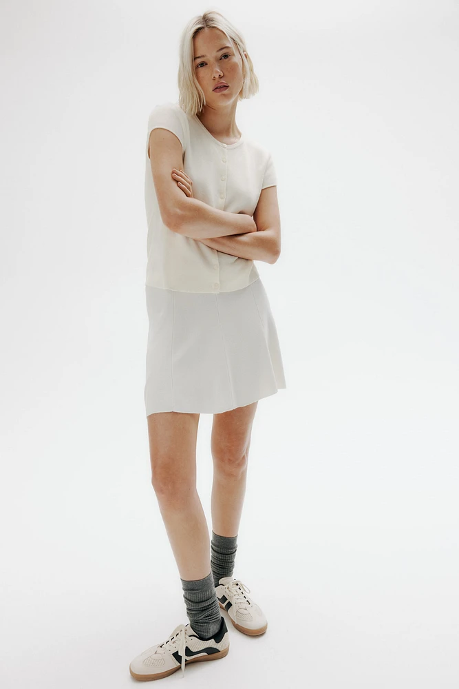 Gilet à manches courtes en fin tricot