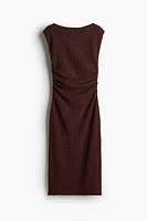 Robe moulante à effet drapé