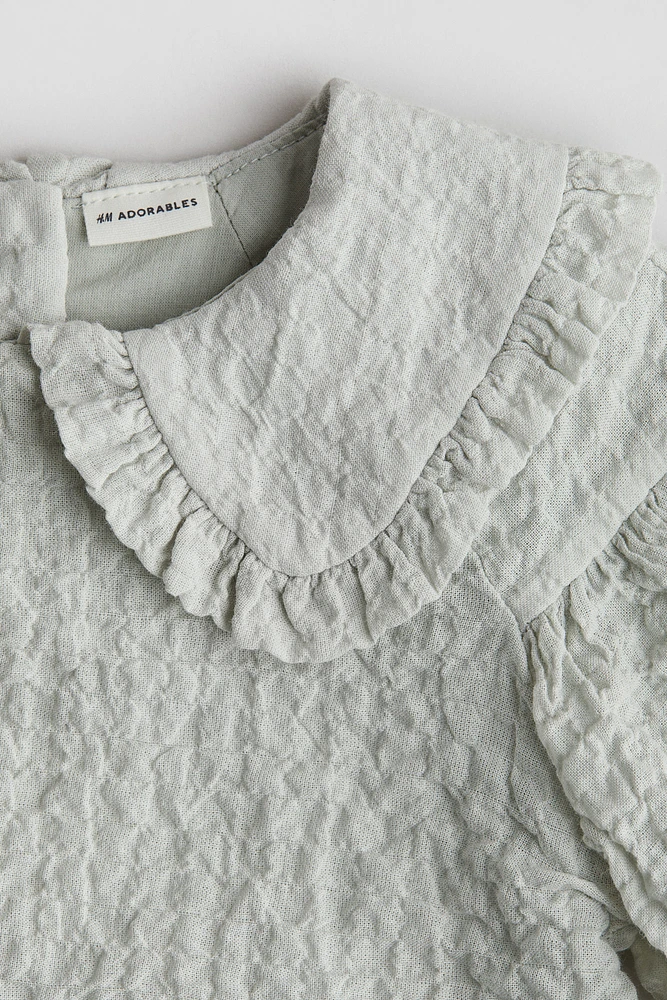 Robe en coton avec manches bouffantes