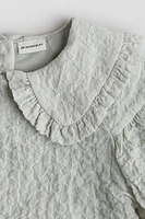 Robe en coton avec manches bouffantes