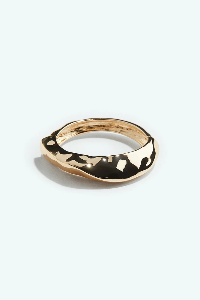 Bracelet asymétrique à charnière